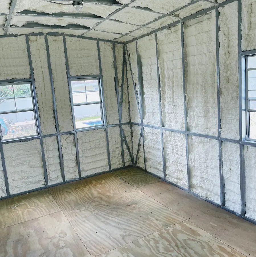Closed-cell spray foam insulation applied to wall cavities in a residential project in Longview